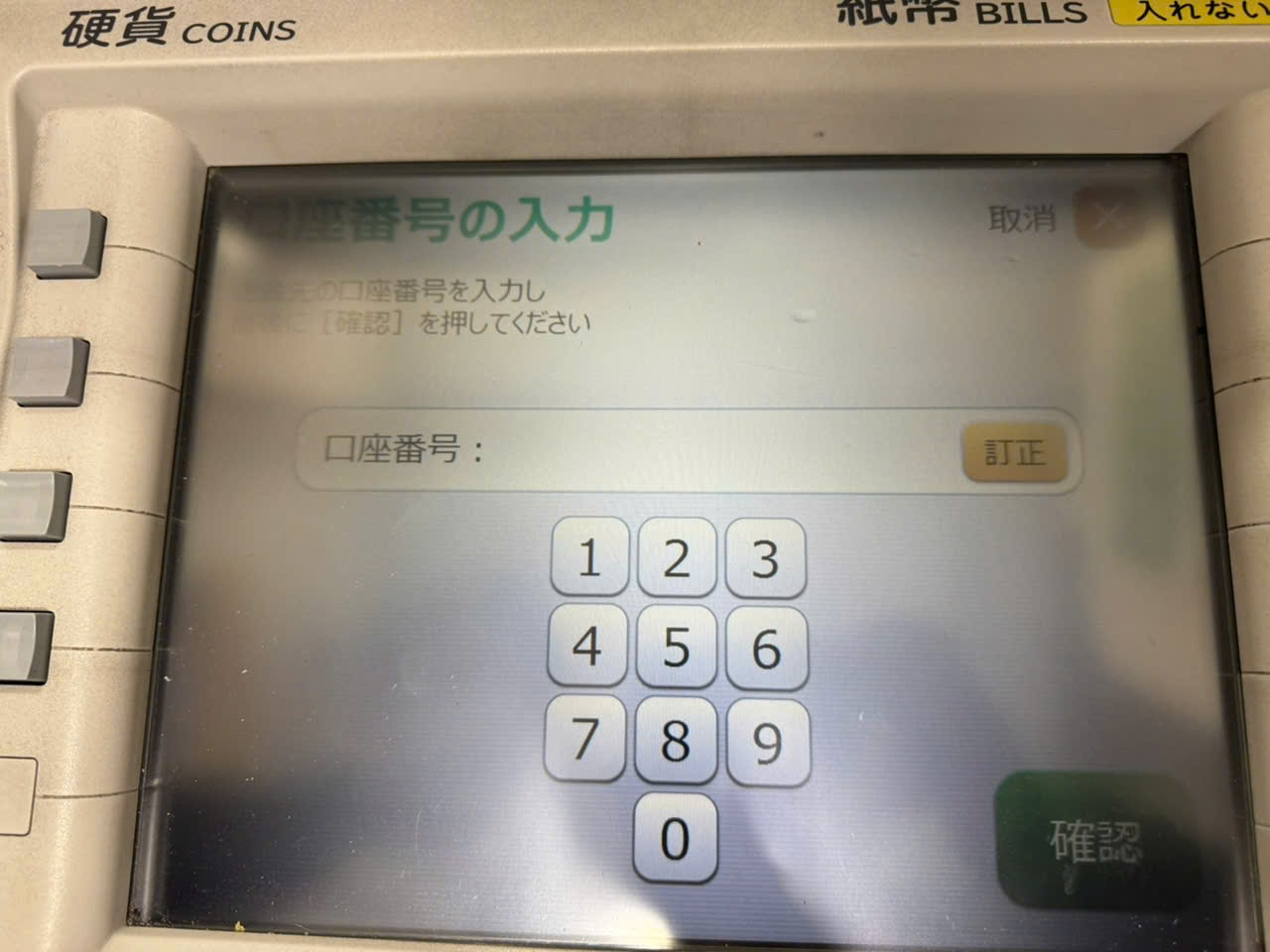 A hand inserting a SIM card into a phone